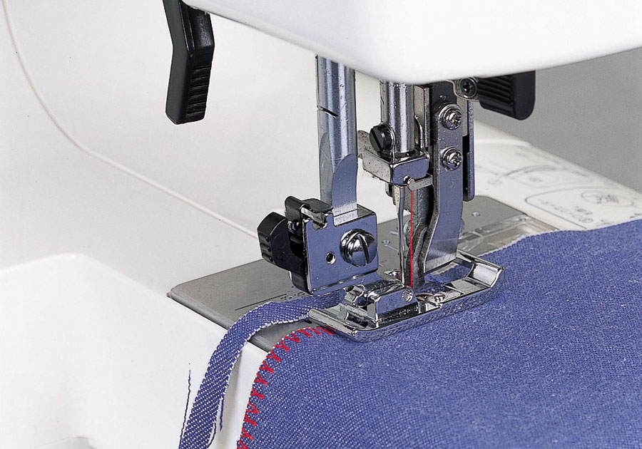 Janome Jem Gold Plus Portable Sewing Machine with Light Serging System