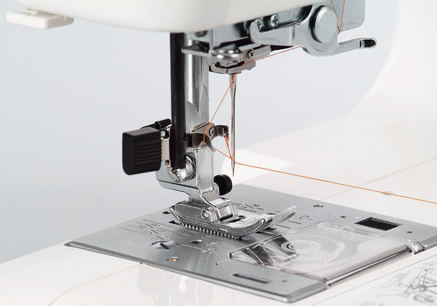 Janome Jem Gold Plus Portable Sewing Machine with Light Serging System